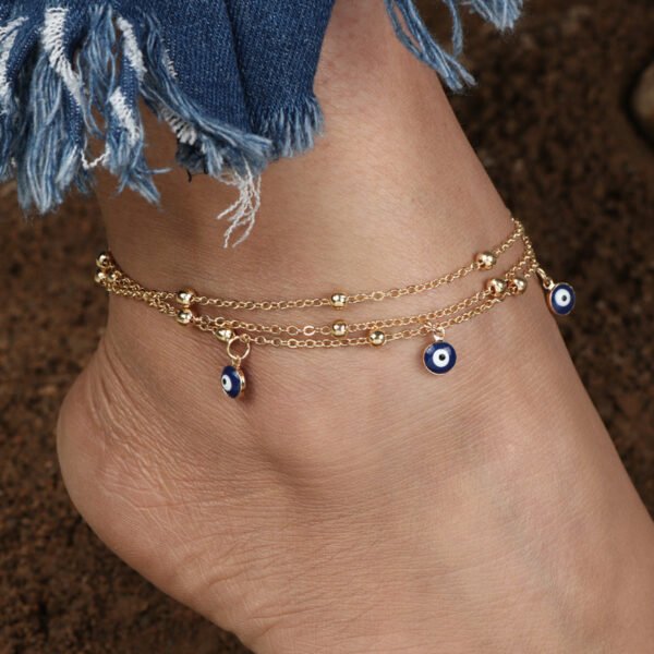 Eye Pendant Beaded Anklet – Stylish Footwear Jewelry

Trendy eye charm anklet with a delicate beaded chain, perfect for adding a fashionable touch to any outfit.