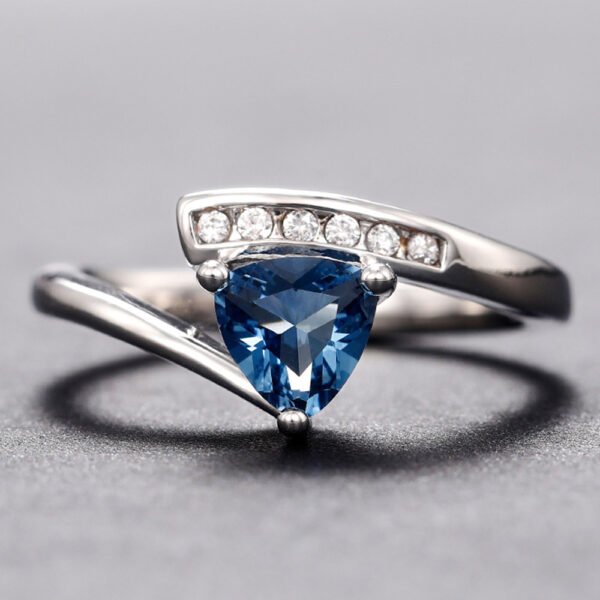 Elegant Micro-Inlaid Zircon Ring for Women – Twisted Design with Blue & Black Stones